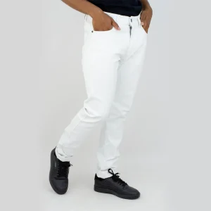 Form-fitting wax jeans with a sleek finish, combining style and practicality.