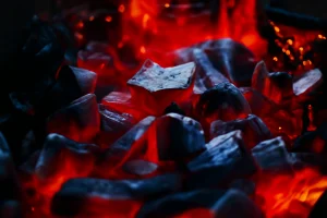 Best charcoal glowing embers burning with intense heat and flavor.