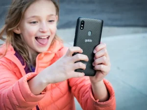 Teen using Gabb Phone safely at home
