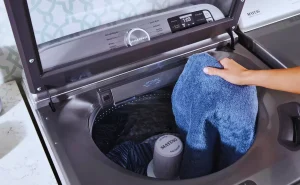 Noise level in washers with agitators during heavy load cycles.