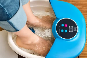 Close-up of a person's feet submerged in a foot spa