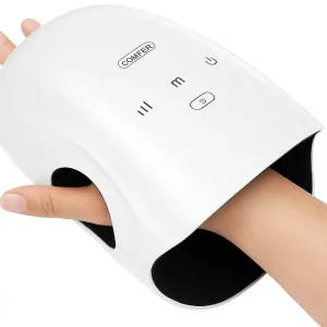 Hand inside a white electric hand massager.