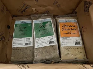 Frozen packages of pet food labeled