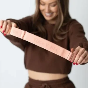Tucky Belt being held by a smiling woman