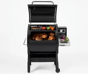 Grilled meats on a digital BBQ smoker