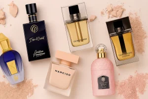 Perfume bottles on soft blush background