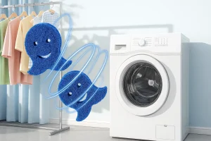 Smiling blue sponges near washer unit